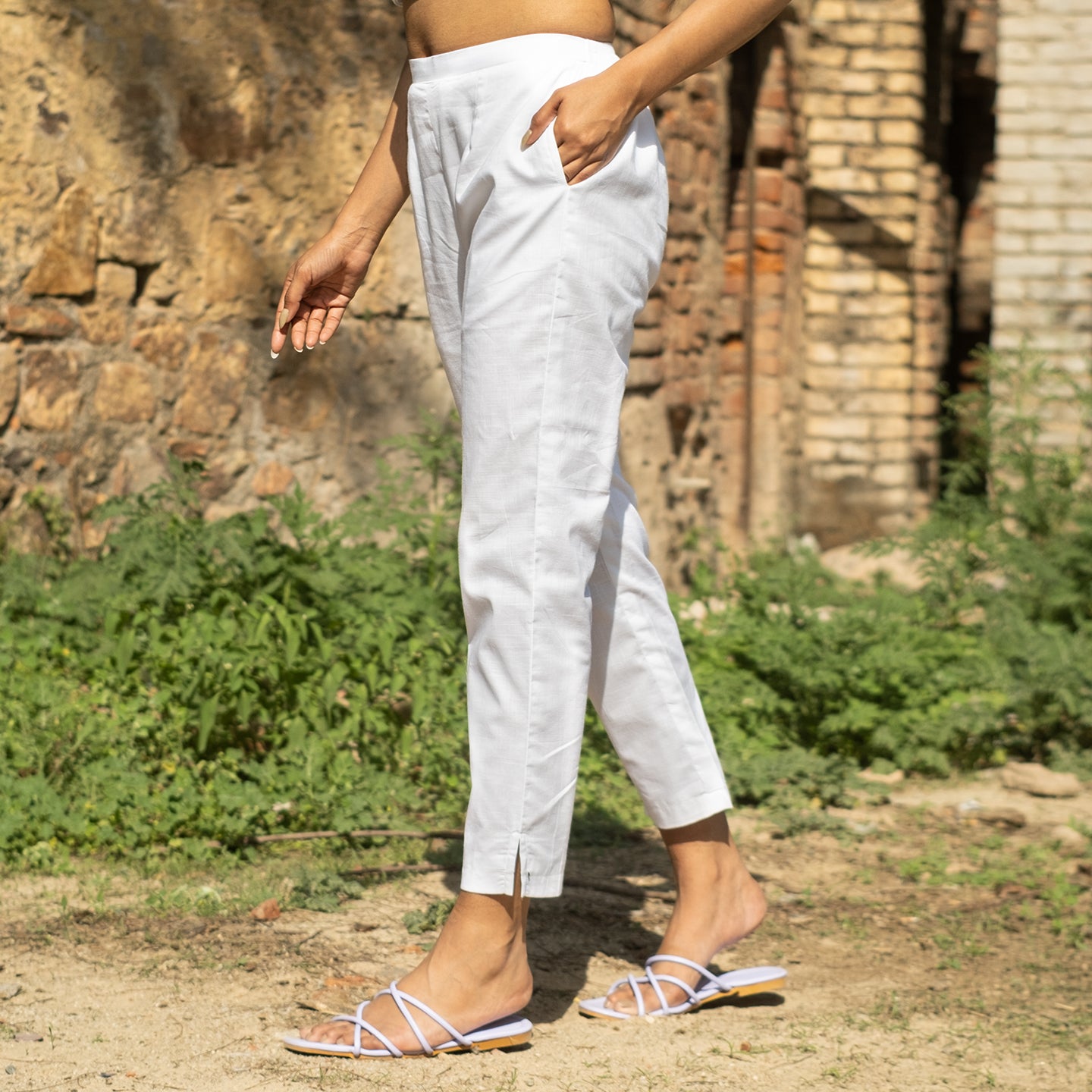 White Oversized short kurta with side slits paired with cigarette pants sets Set