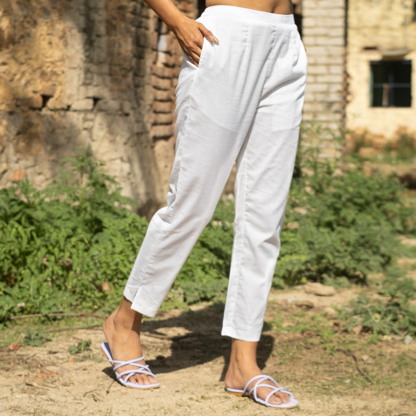 White Oversized short kurta with side slits paired with cigarette pants sets Set