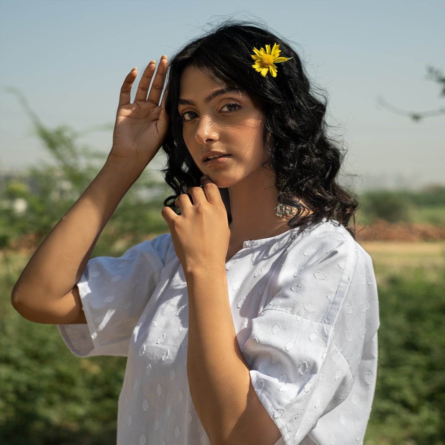 White Oversized short kurta with side slits paired with cigarette pants sets Set