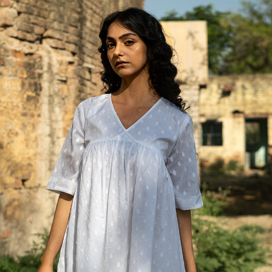 White short A-line dress with front gathers