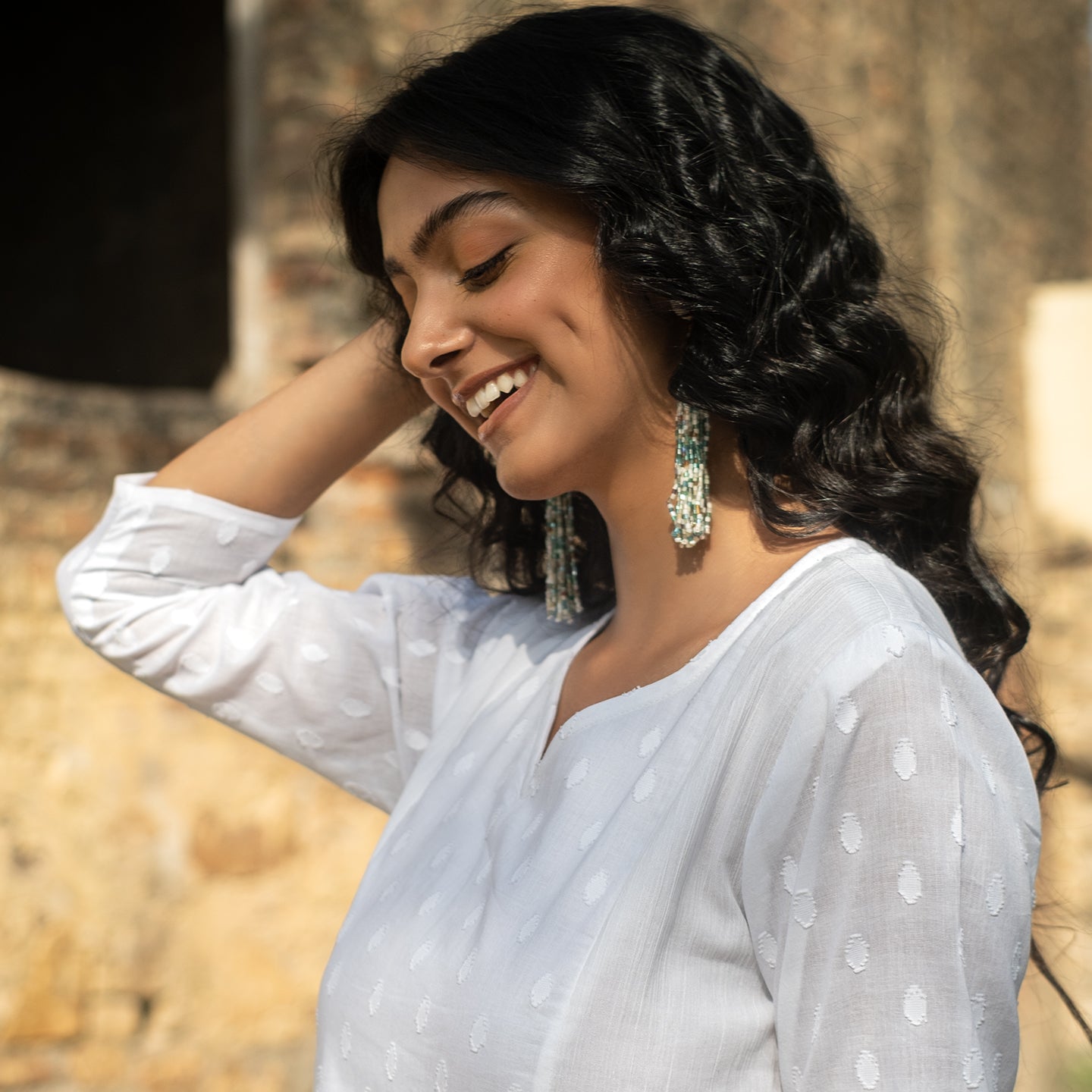 White panelled self detail kurta paired with straight fit pants