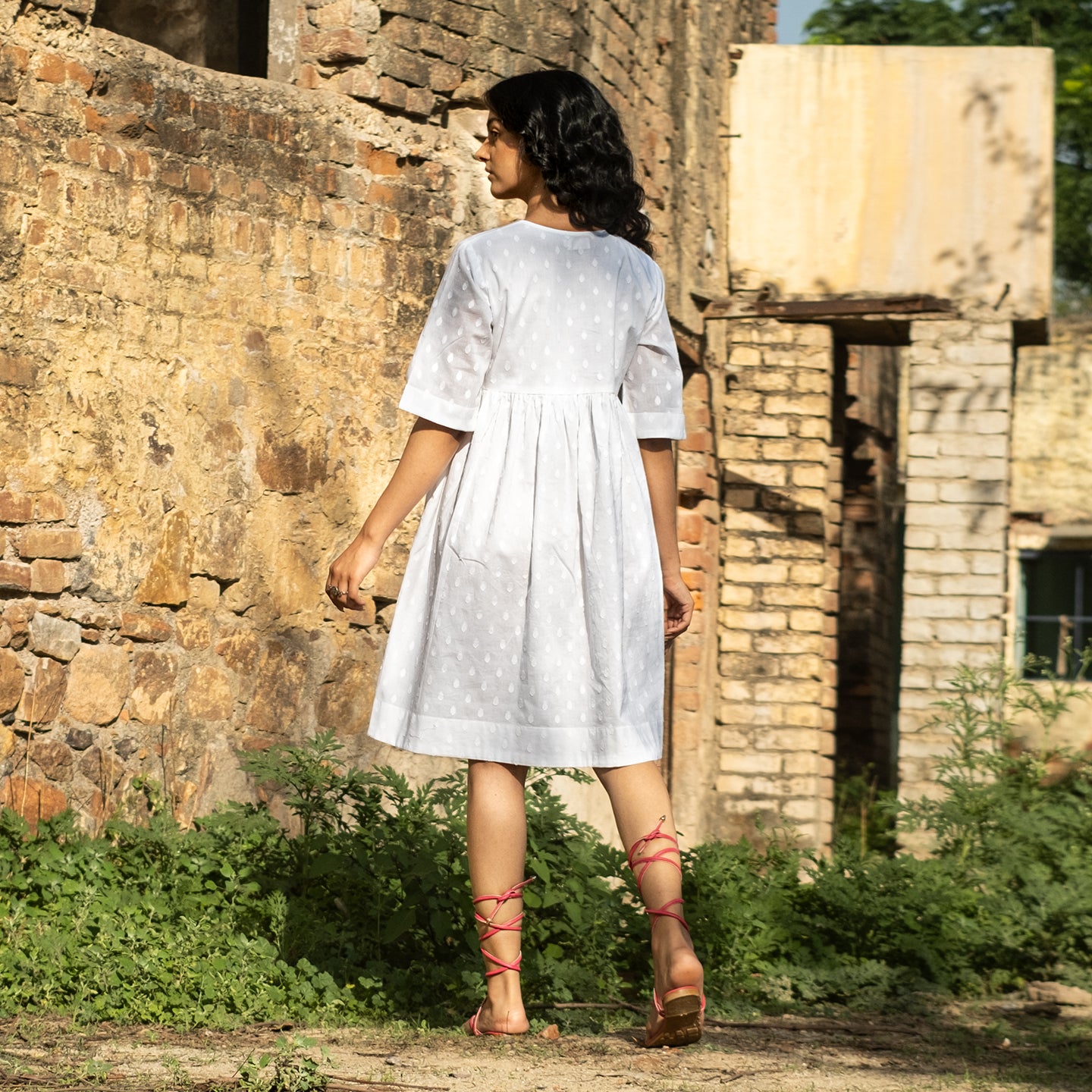 White short A-line dress with front gathers