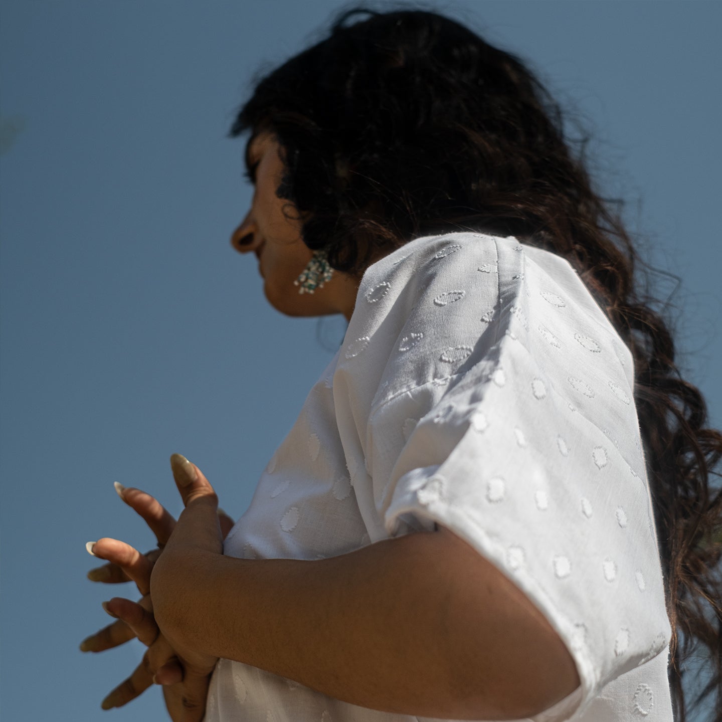 White Oversized short kurta with side slits paired with cigarette pants sets Set