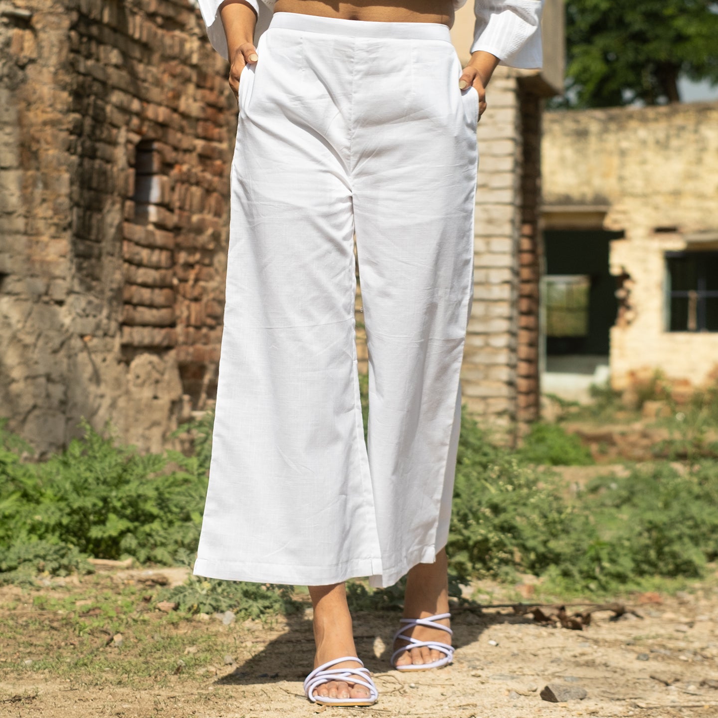 White Cotton round neck knee length Anarkali style Kurta paired with palazzo pants
