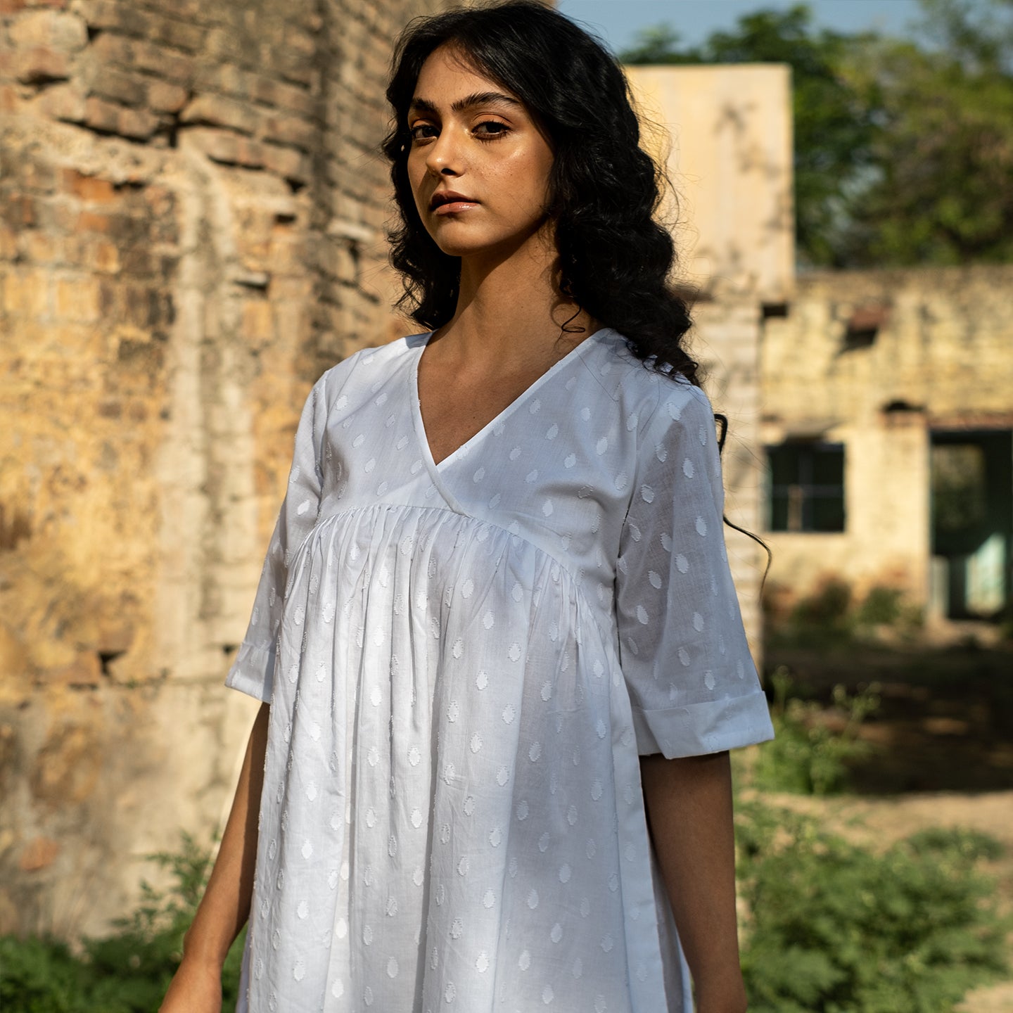 White short A-line dress with front gathers