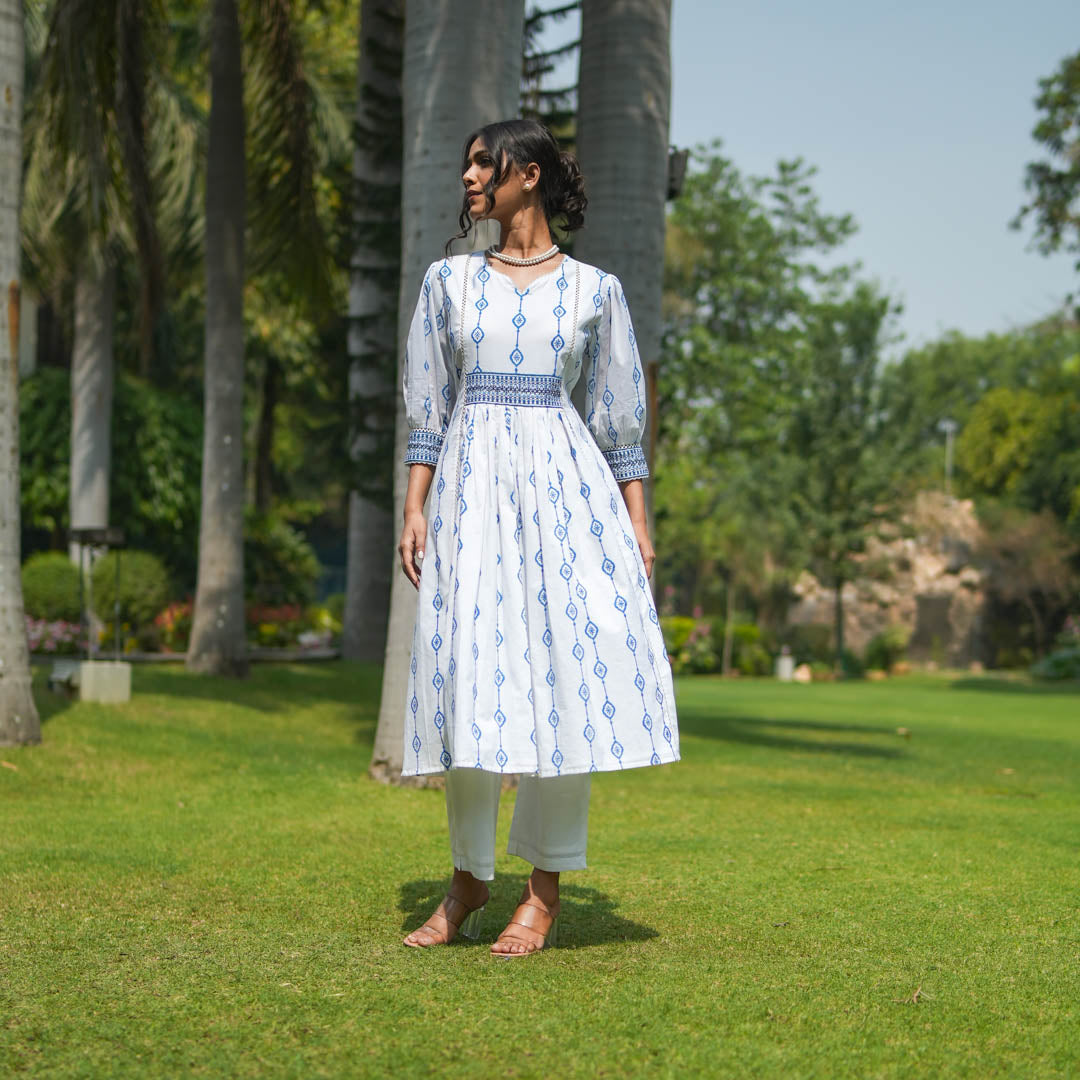 White Hand Block Printed Fit and Flare Kurta Set with Embroidered Waist Detail and Back Tie-up( set of 2 )