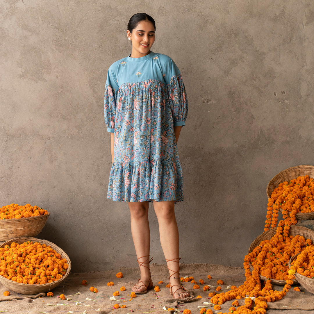Blue short flared tiered dress with embroidery details