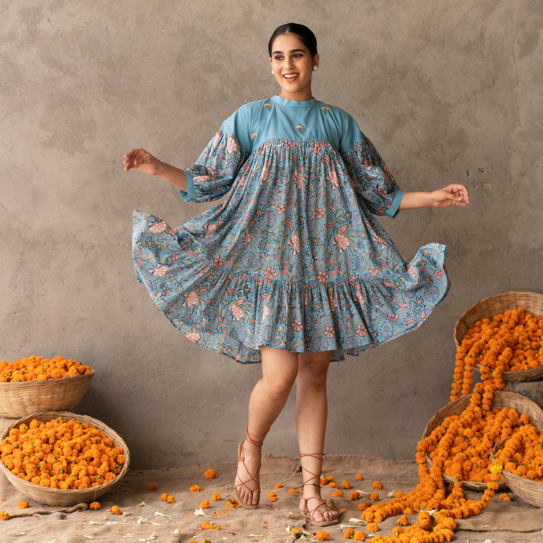 Blue short flared tiered dress with embroidery details