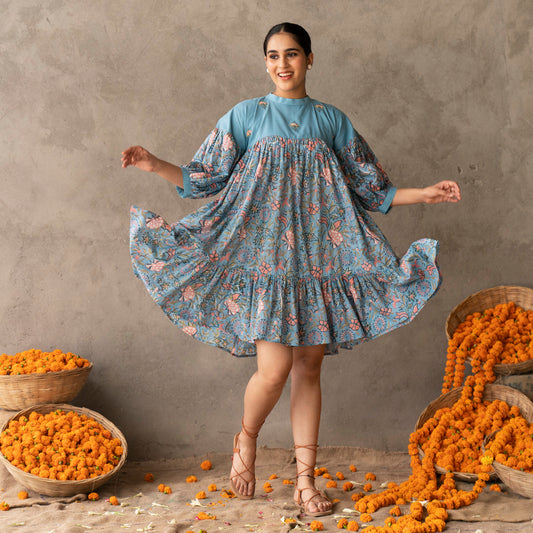 Blue short flared tiered dress with embroidery details