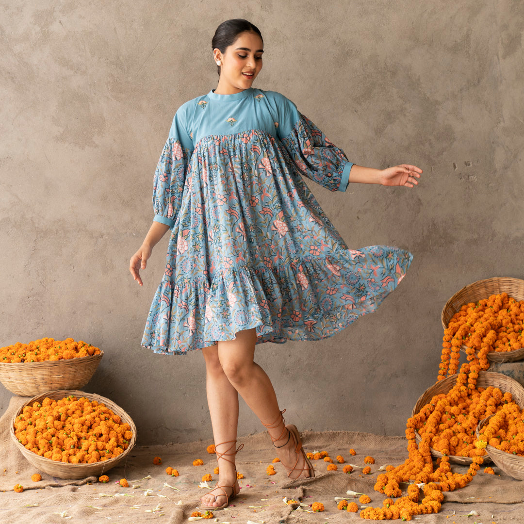 Blue short flared tiered dress with embroidery details