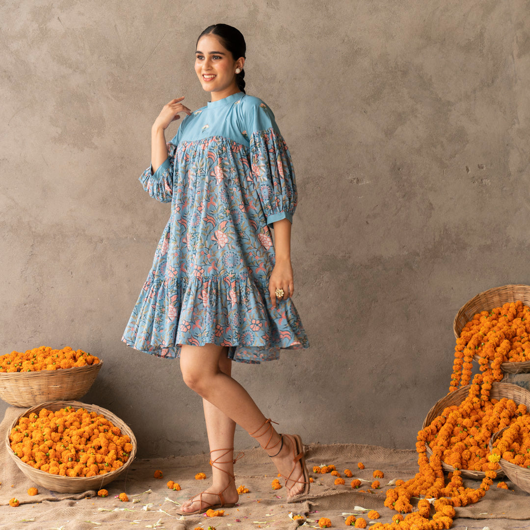 Blue short flared tiered dress with embroidery details