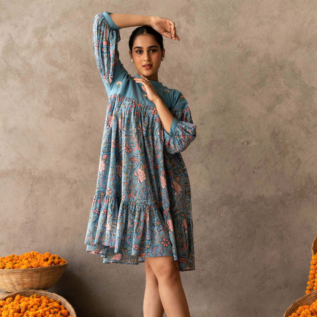 Blue short flared tiered dress with embroidery details