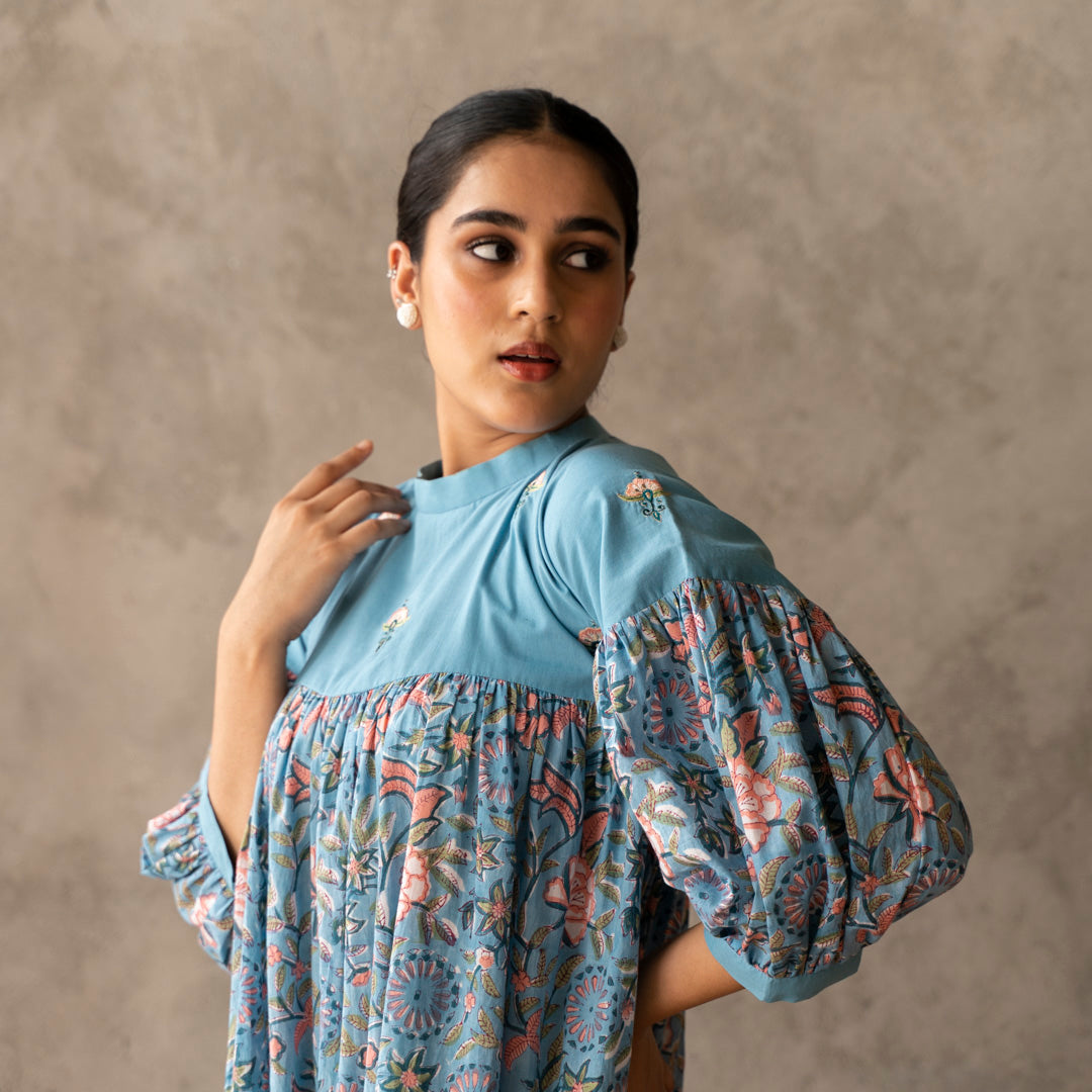 Blue short flared tiered dress with embroidery details