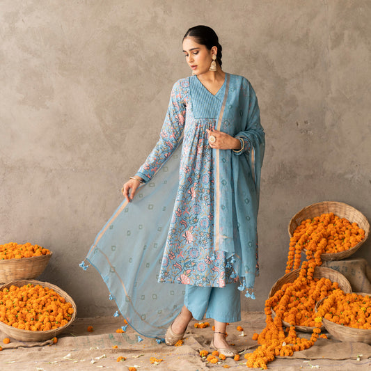 Blue block printed with yoke and sleeve detailed A line suit set with dupatta