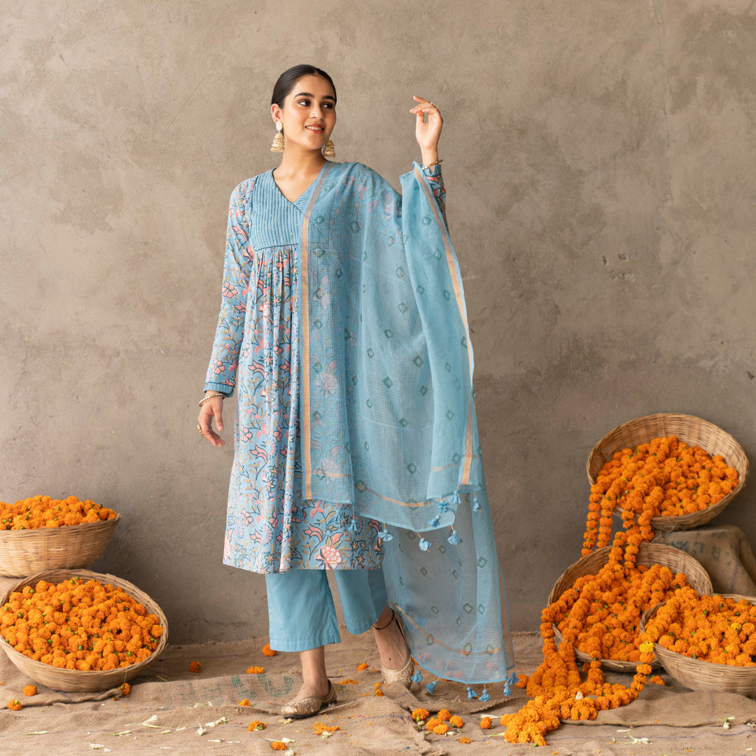 Blue block printed with yoke and sleeve detailed A line suit set with dupatta