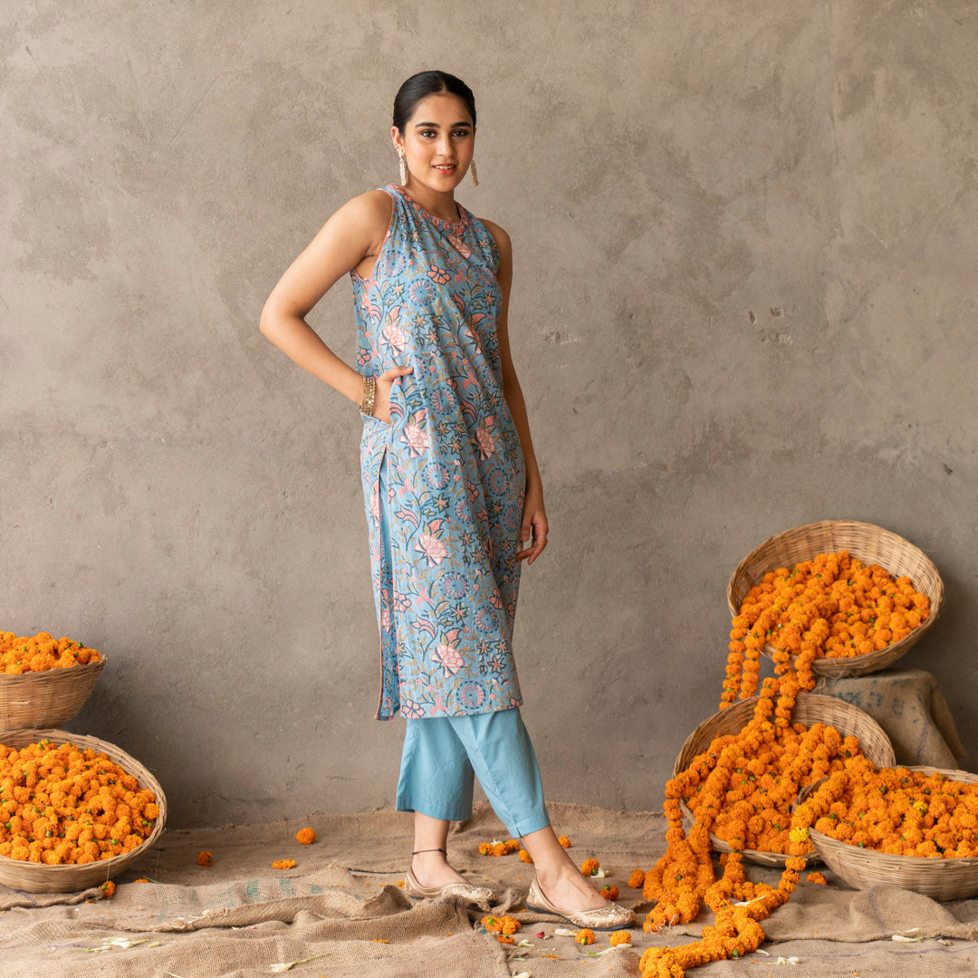 Blue block printed and embroidery detailed straight fit sleevless suit set with dupatta