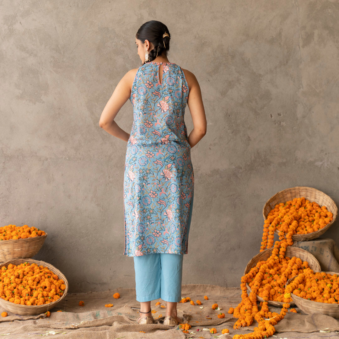 Blue block printed and embroidery detailed straight fit sleevless suit set with dupatta