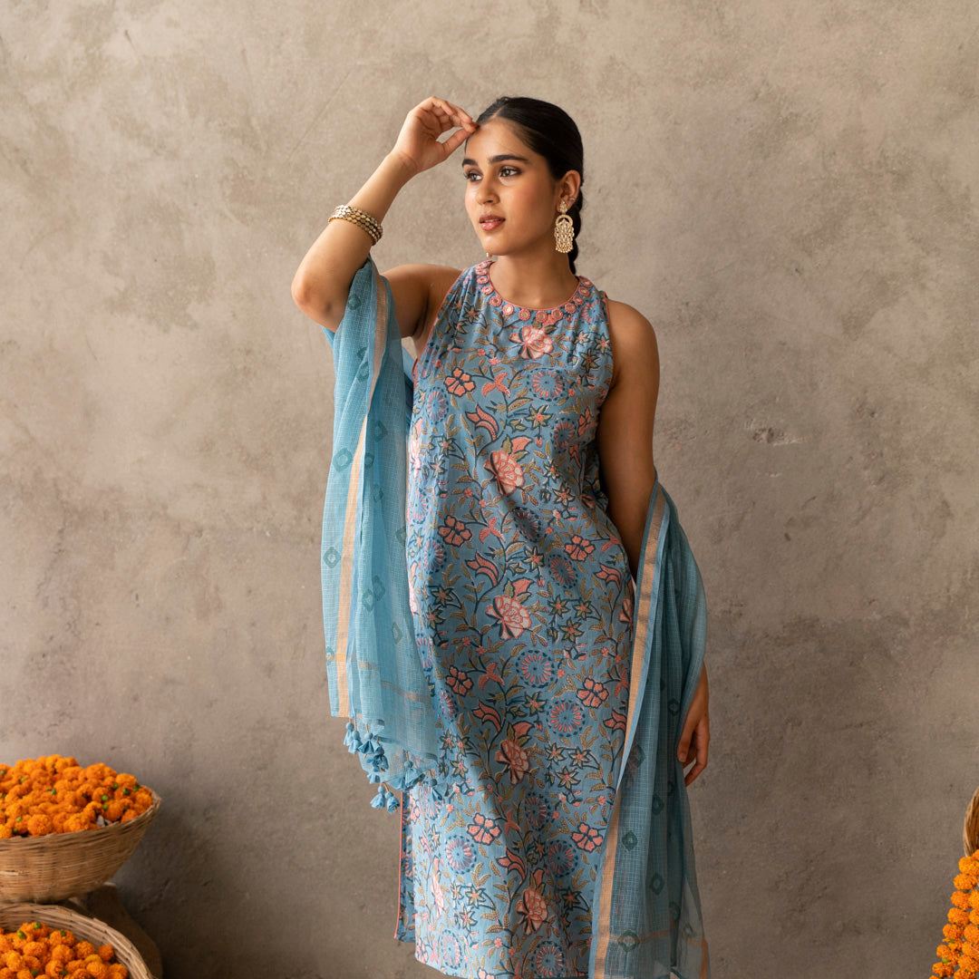 Blue block printed and embroidery detailed straight fit sleevless suit set with dupatta