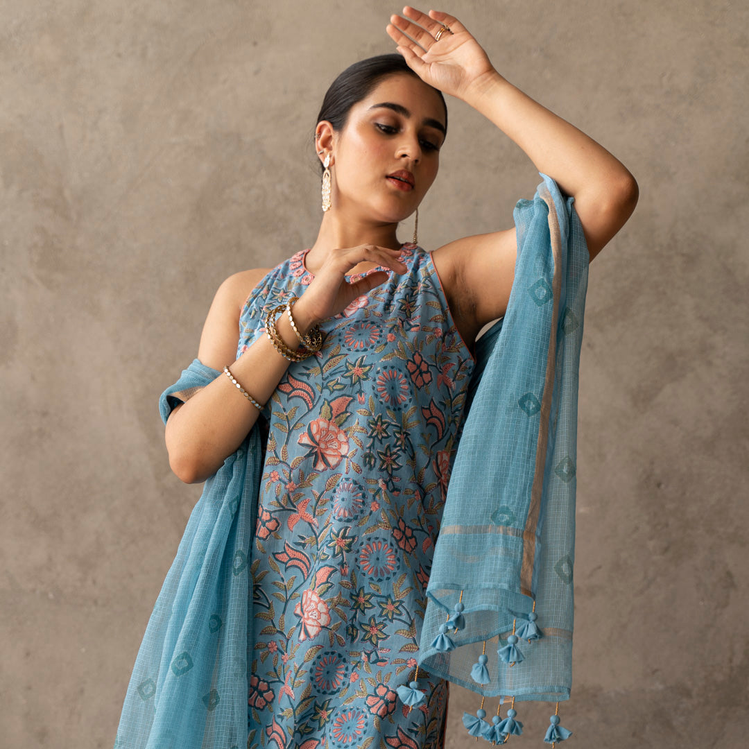 Blue block printed and embroidery detailed straight fit sleevless suit set with dupatta
