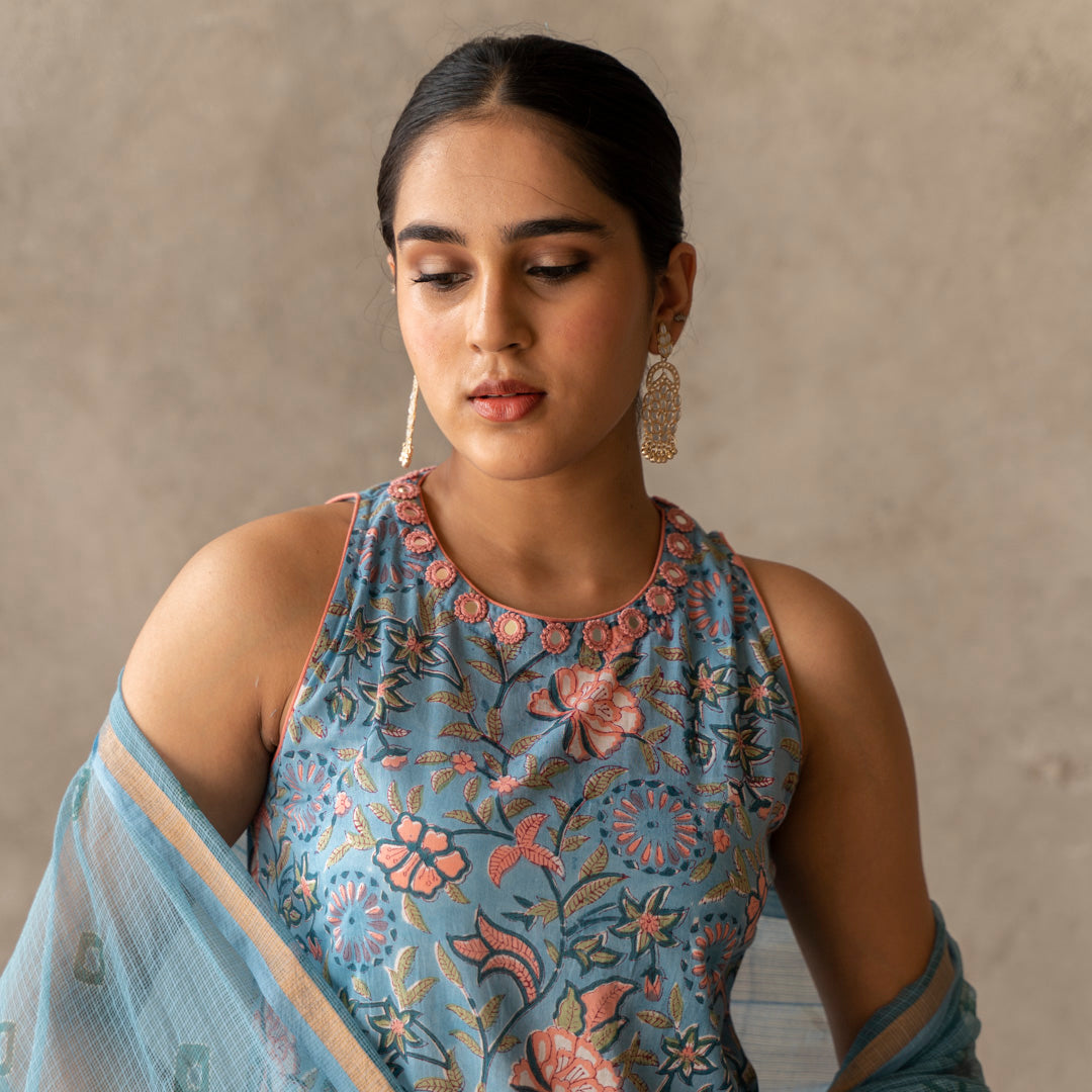 Blue block printed and embroidery detailed straight fit sleevless suit set with dupatta