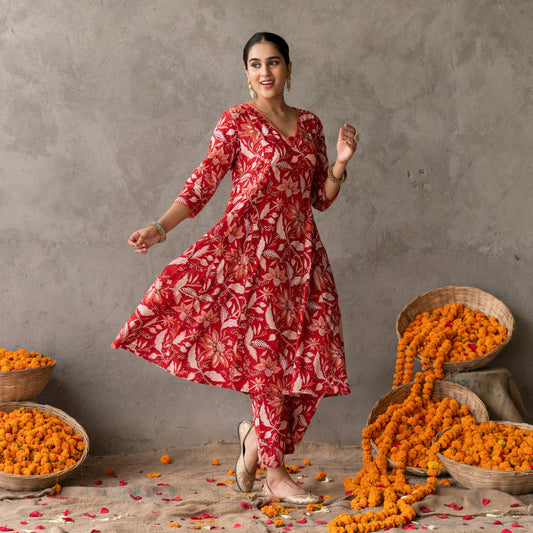 Red block printed panelled anarkali kurta with contrast piping detail paired with red block printed straight pants set