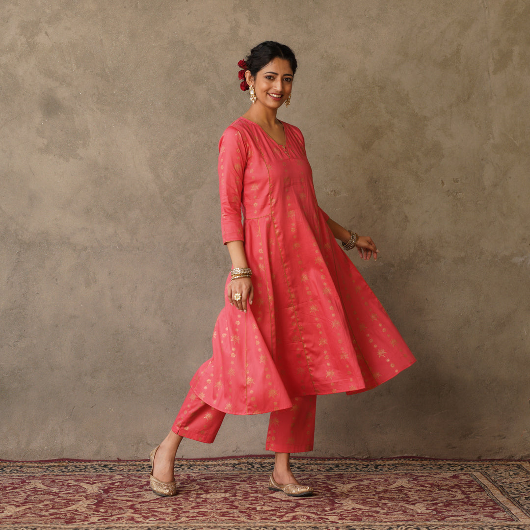 Coral block printed Anarkali kurta with hand embroidery and piping details