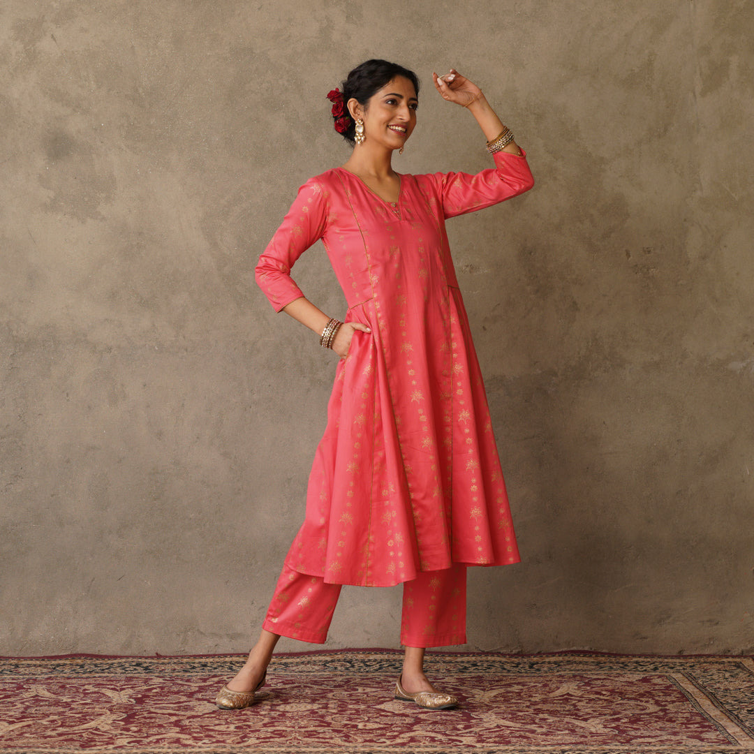 Coral block printed Anarkali kurta with hand embroidery and piping details