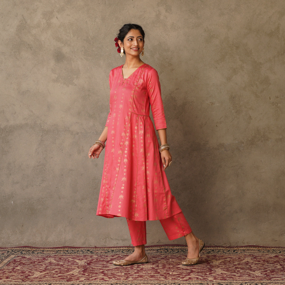 Coral block printed Anarkali kurta with hand embroidery and piping details