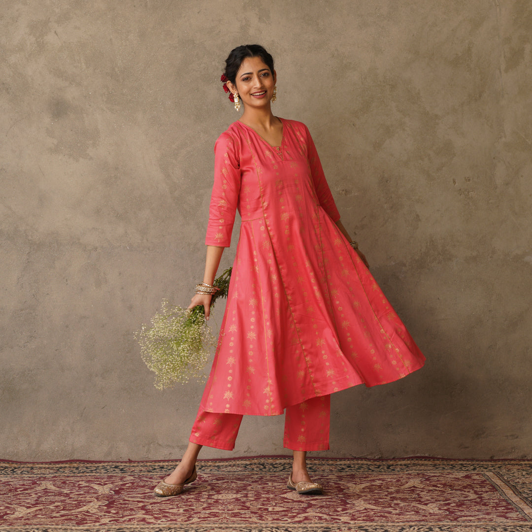Coral block printed Anarkali kurta with hand embroidery and piping details