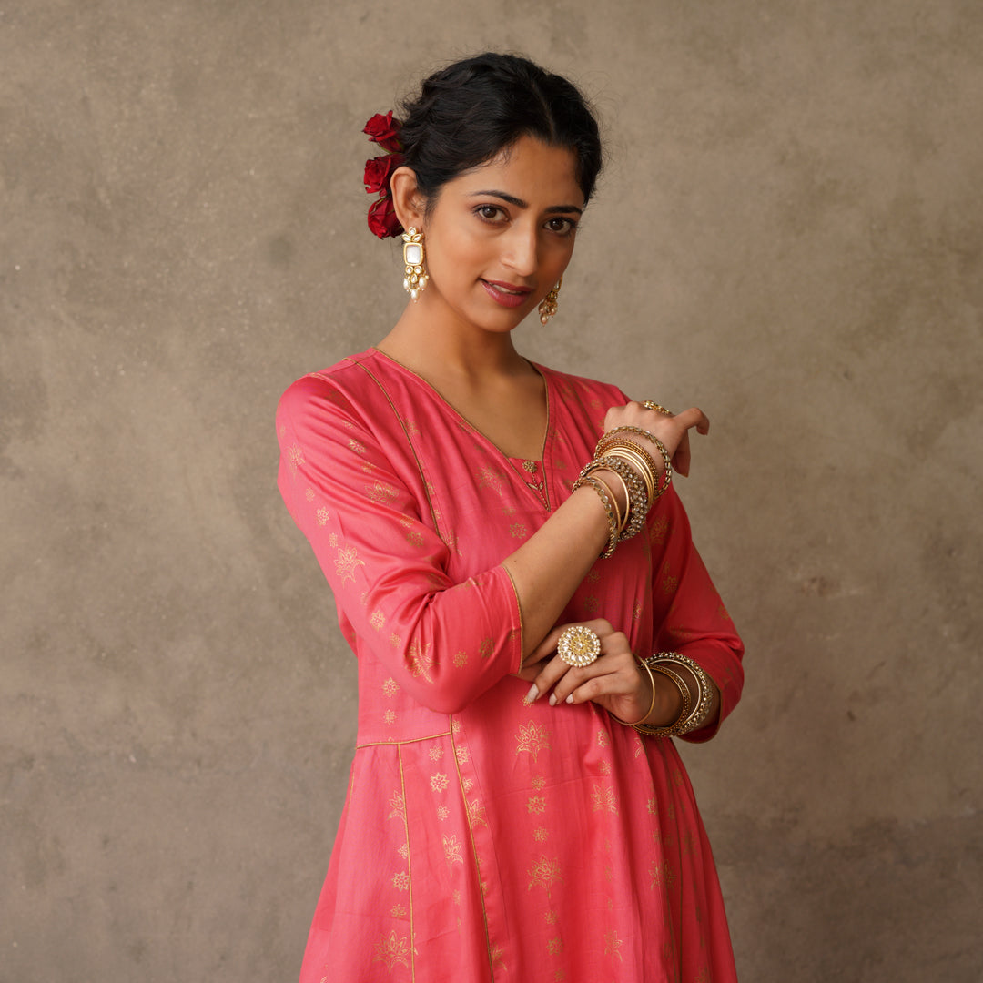 Coral block printed Anarkali kurta with hand embroidery and piping details