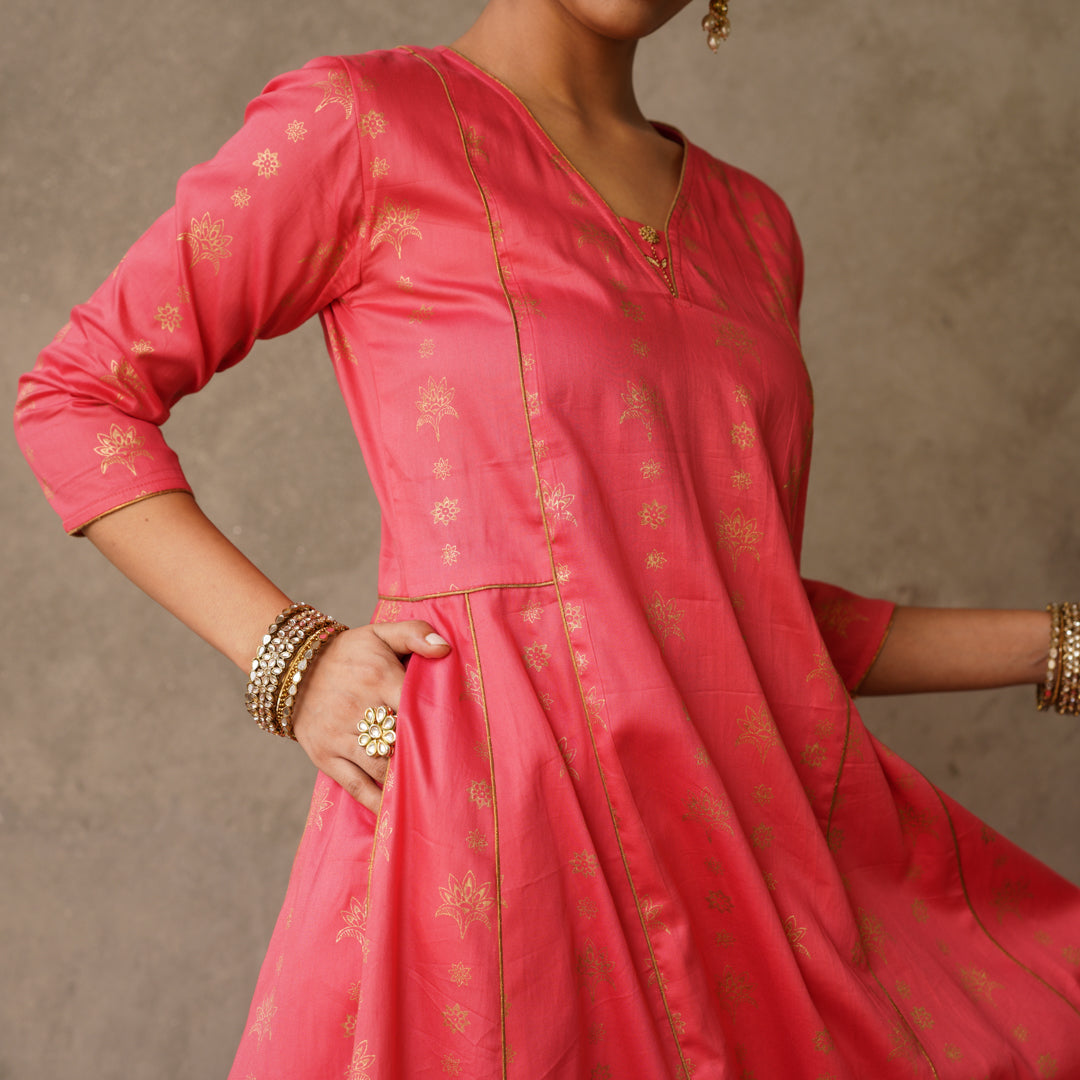 Coral block printed Anarkali kurta with hand embroidery and piping details