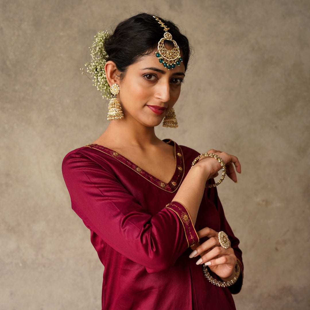 Front Pleat Solid Plum Kurta with Hand Embroidery and Gold Printed Details
