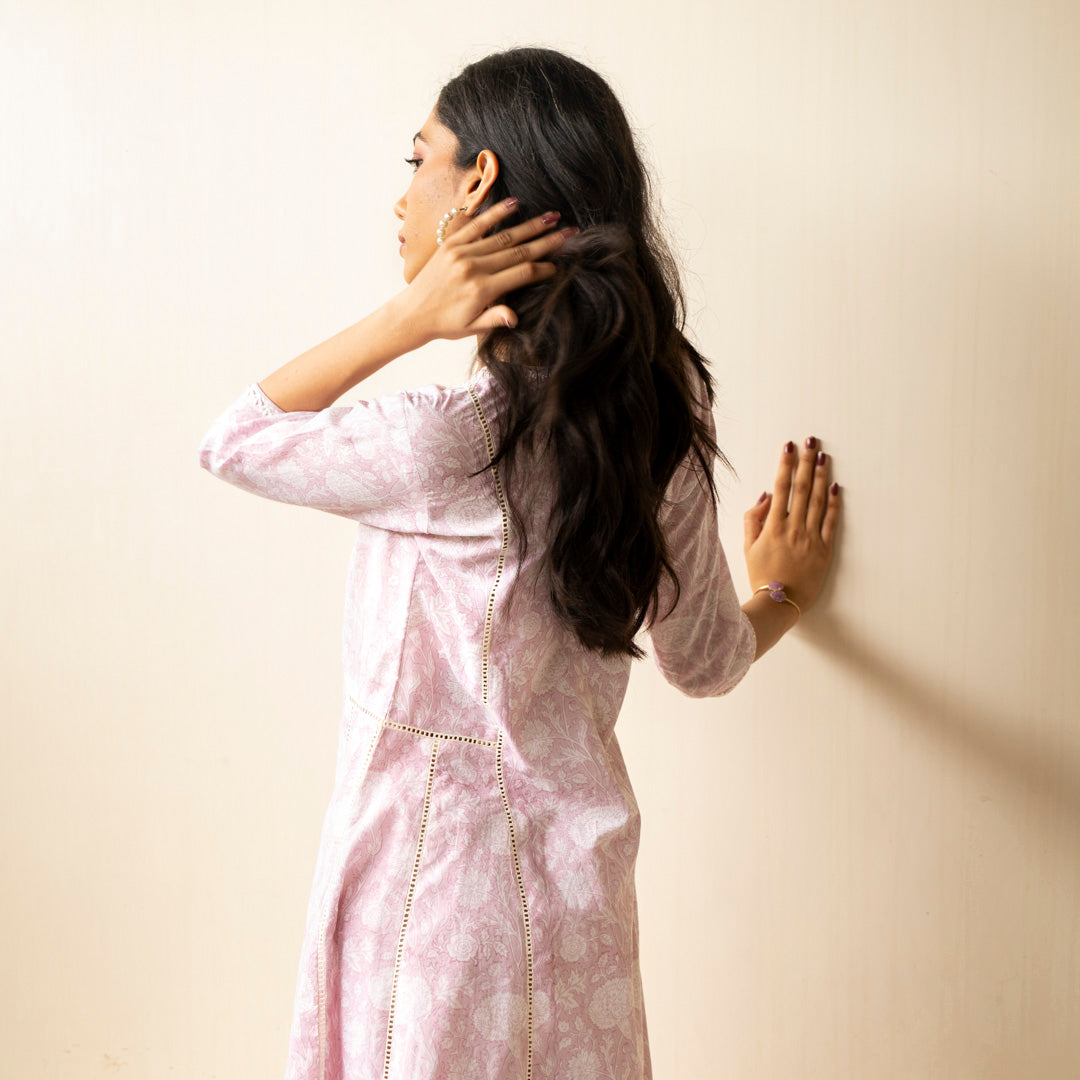 Blush pink block printed Anarkali kurta with embroidery detail neckline paired with shibori tie dye trousers set