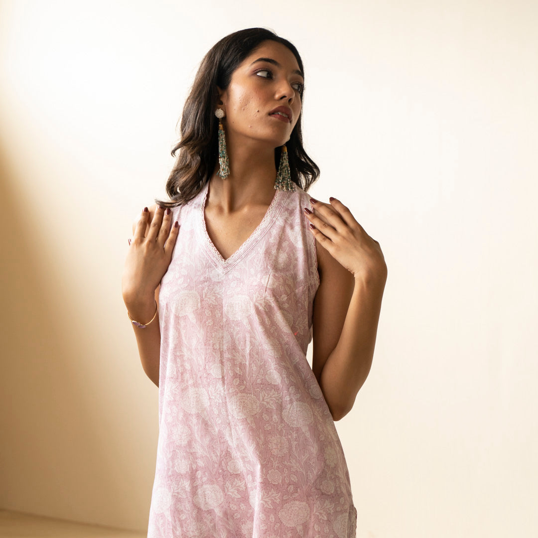 Blush Pink hand block printed sleevless kurti with side slits paired with shibori tie dye trousers set