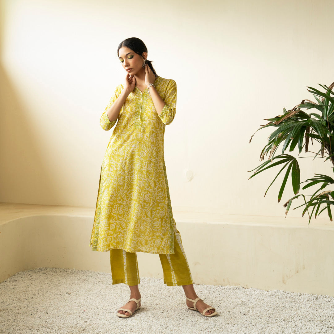 Chartreuse green hand block printed straight fit kurta paired with tie dye trouser set