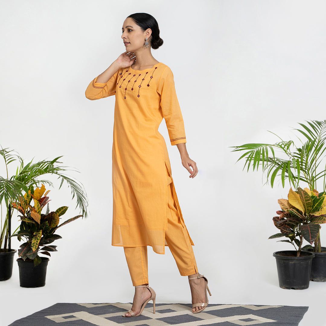 Mirror Work on Orange Suit