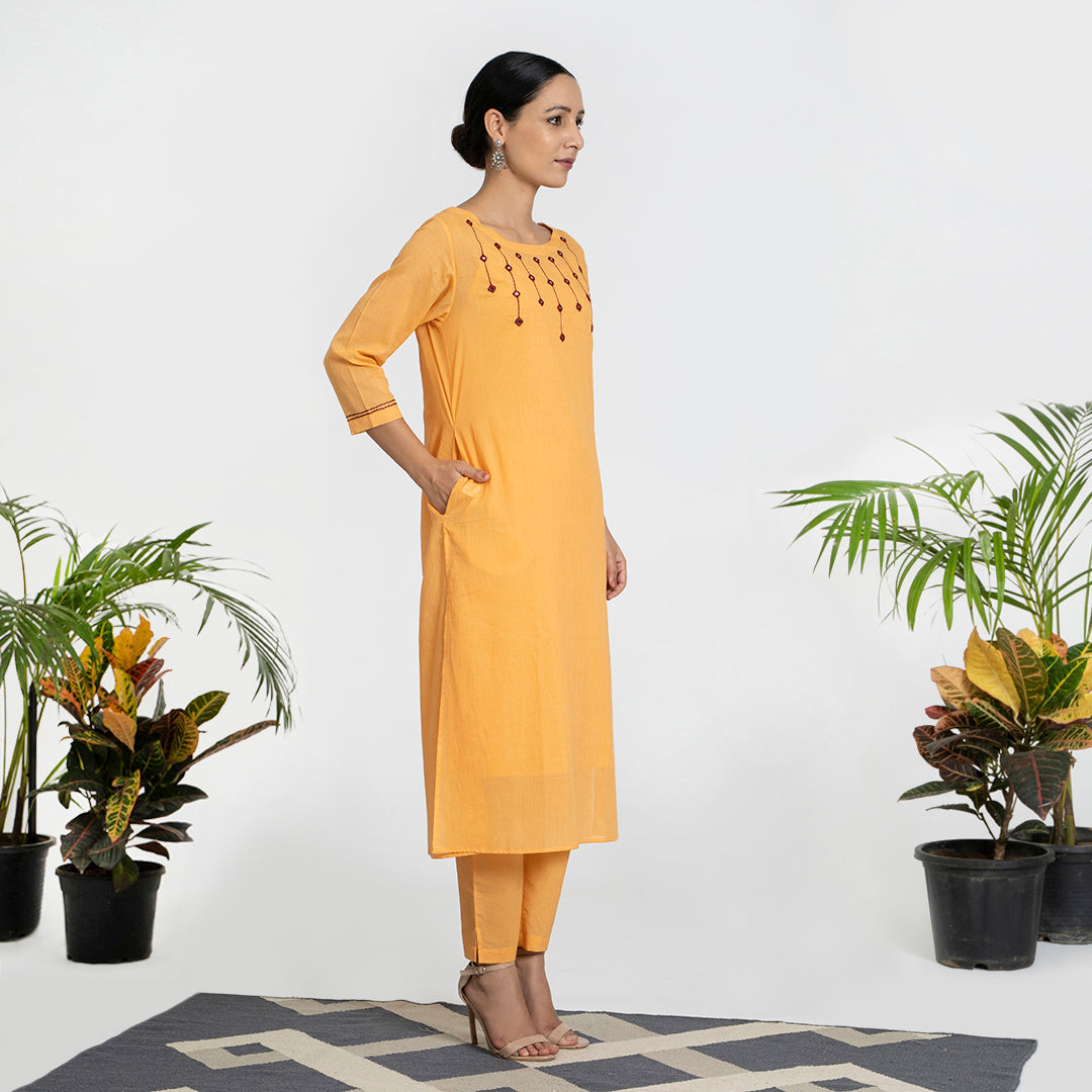 Mirror Work on Orange Suit