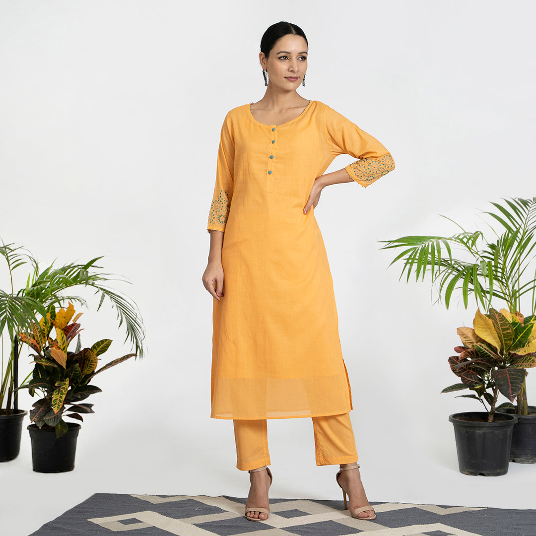 Geometric Work on Orange Suit with Solid Dupatta