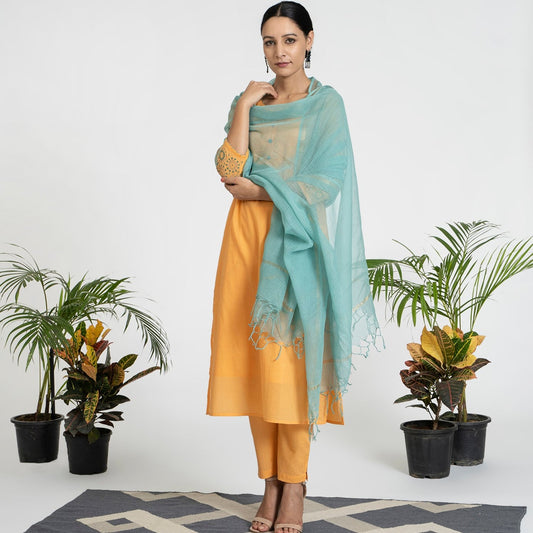 Geometric Work on Orange Suit with Solid Dupatta
