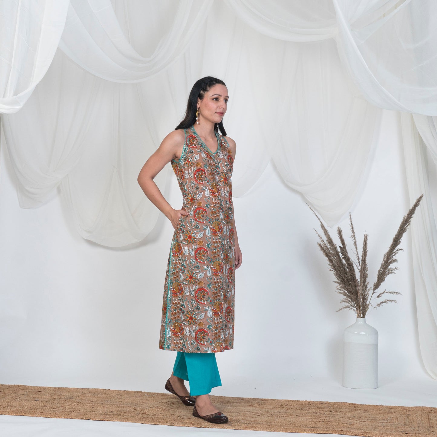 Sleeveless Kurta Set in Hazel brown Print with Solid Pants