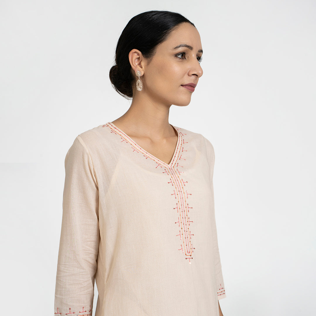 Contrast Embroidery on Beige Suit