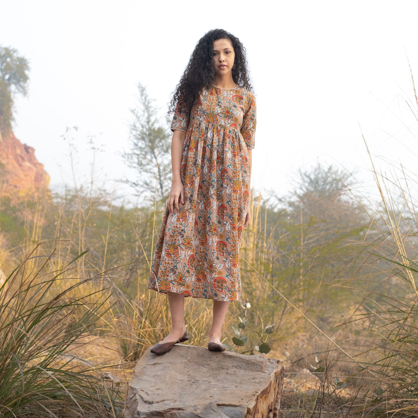 Fit and flare midi dress with back button detail