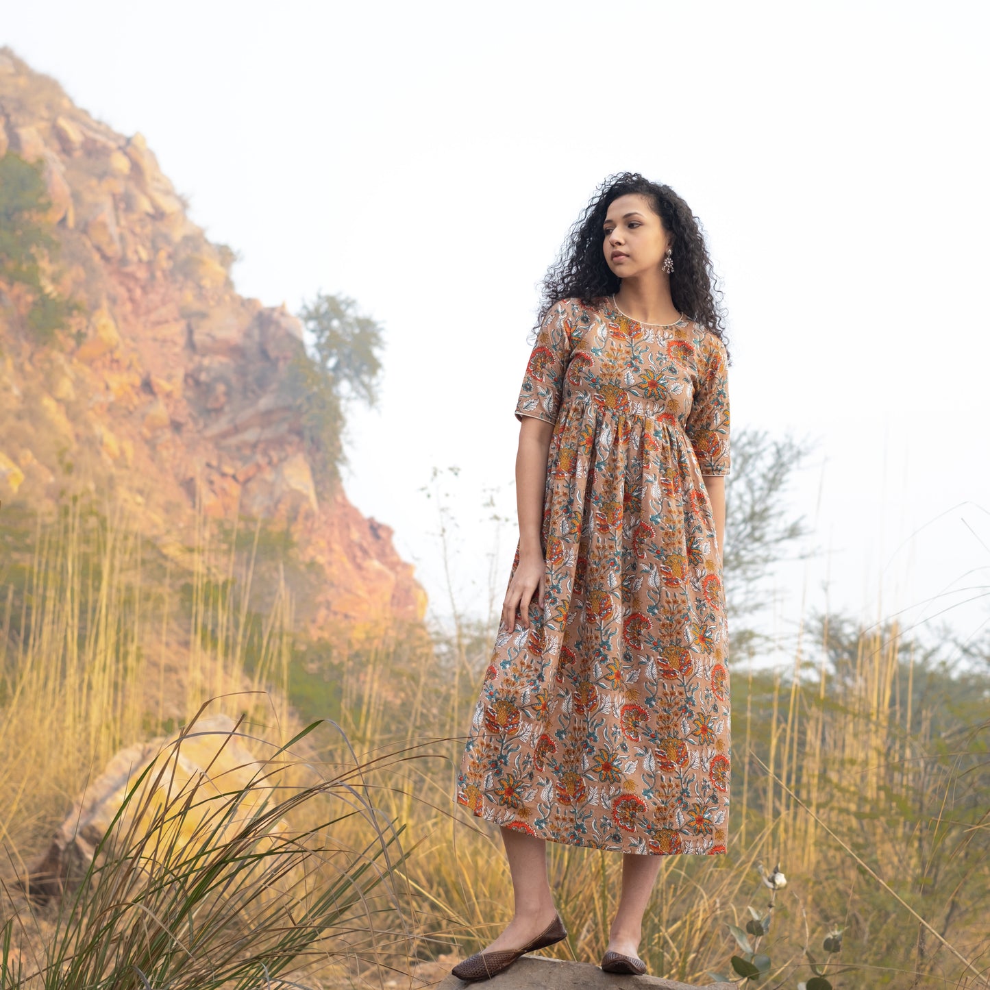 Fit and flare midi dress with back button detail