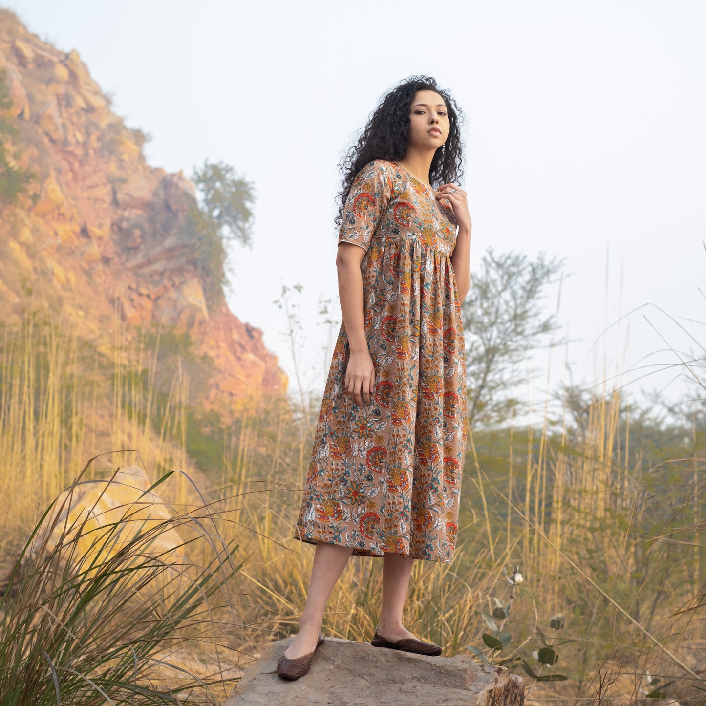 Fit and flare midi dress with back button detail