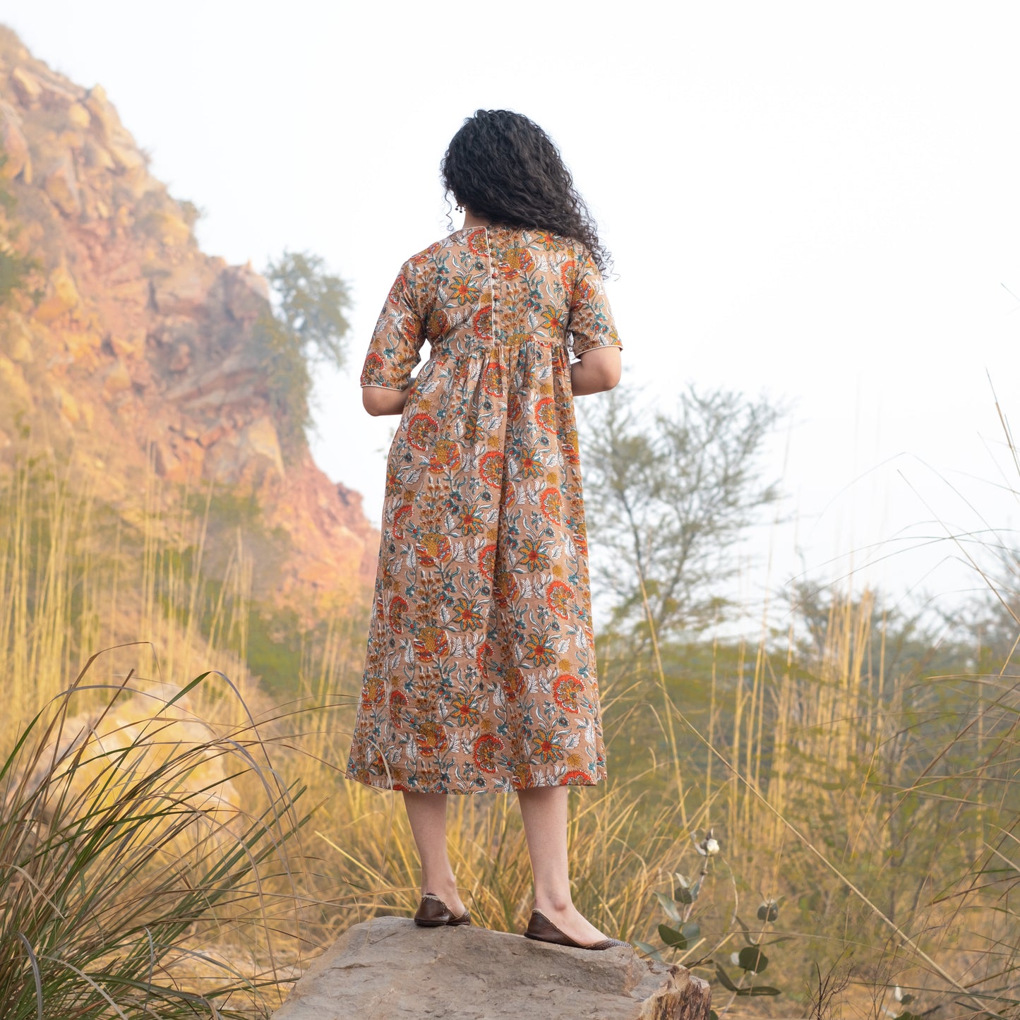 Fit and flare midi dress with back button detail