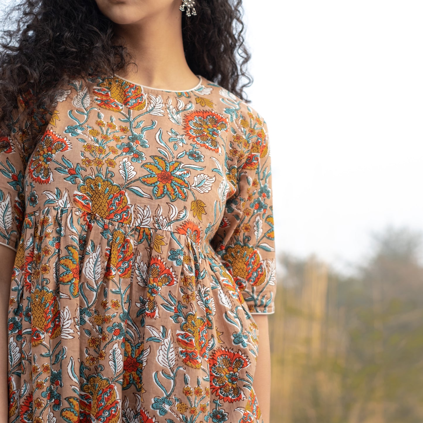 Fit and flare midi dress with back button detail