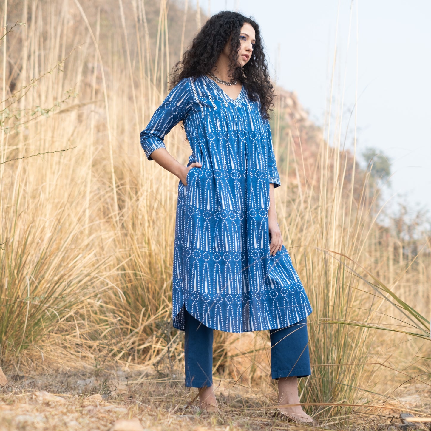 Indigo block printed gathered kurta with V Neck lace detail and solid Indigo pant (Set of 2)