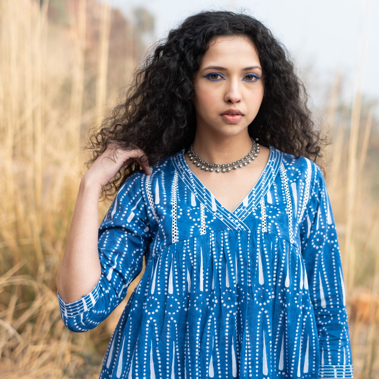 Indigo block printed gathered kurta with V Neck lace detail and solid Indigo pant (Set of 2)
