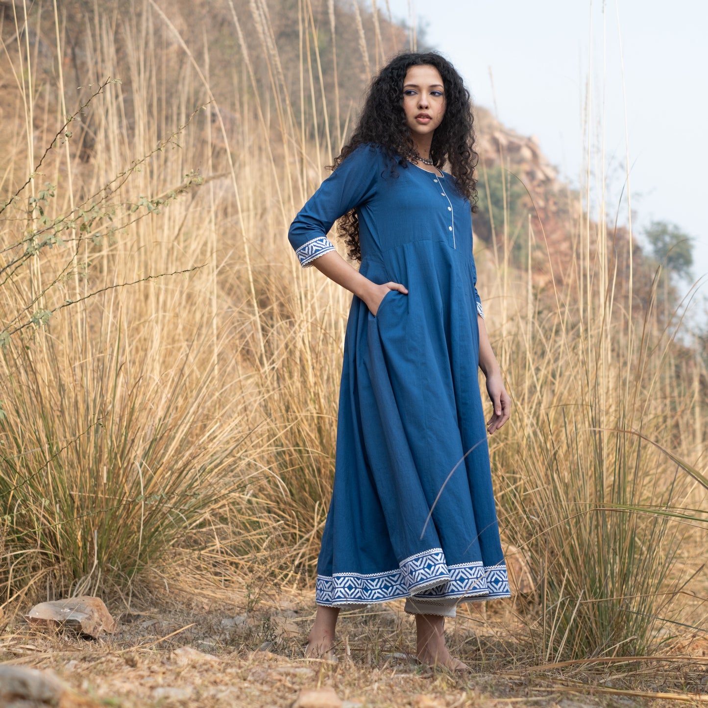 Solid indigo Anarkali kurta with block print border and lace details