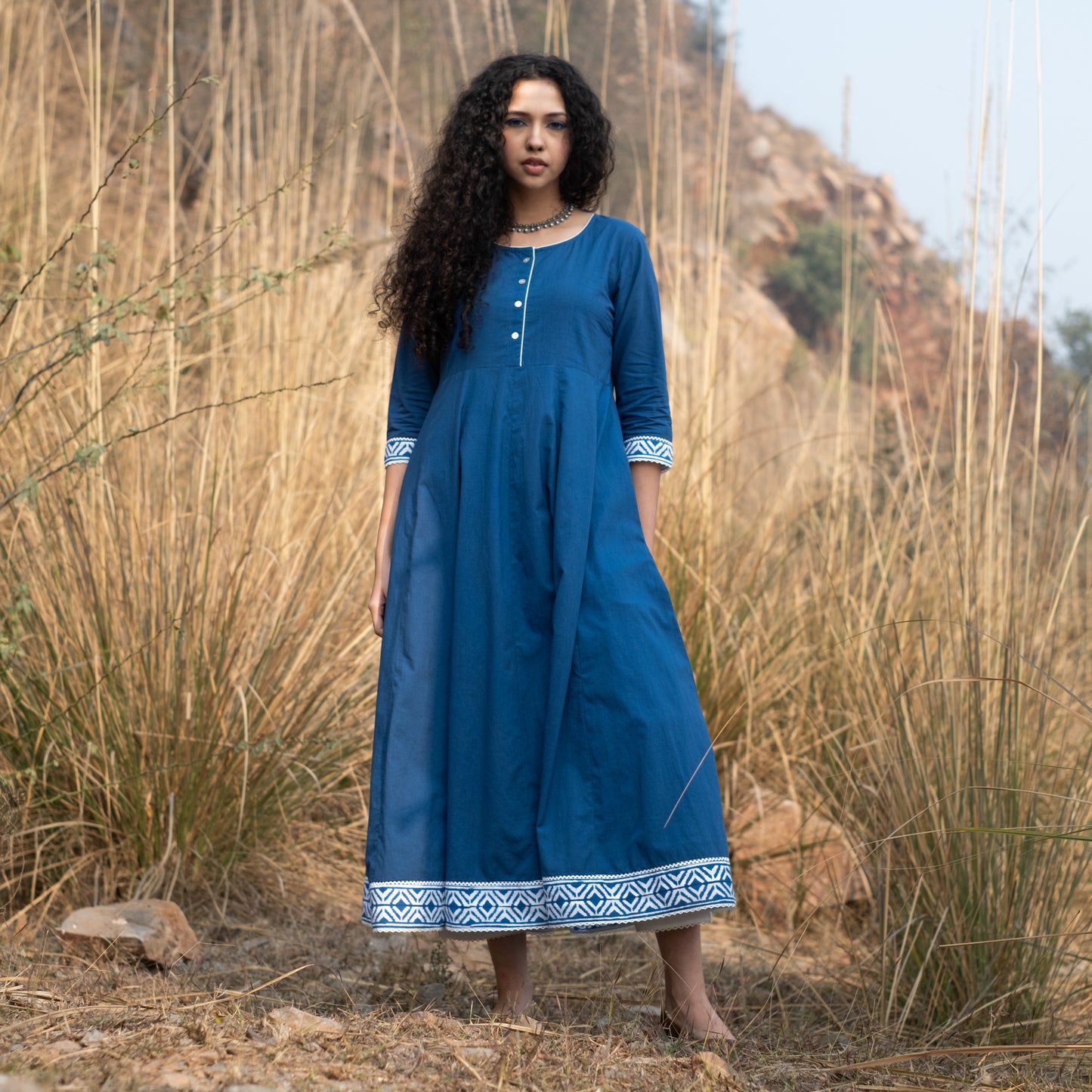 Solid indigo Anarkali kurta with block print border and lace details